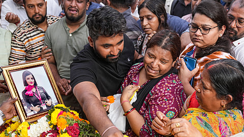 Inconsolable family, friends bid farewell to flight attendant Pinky Mali