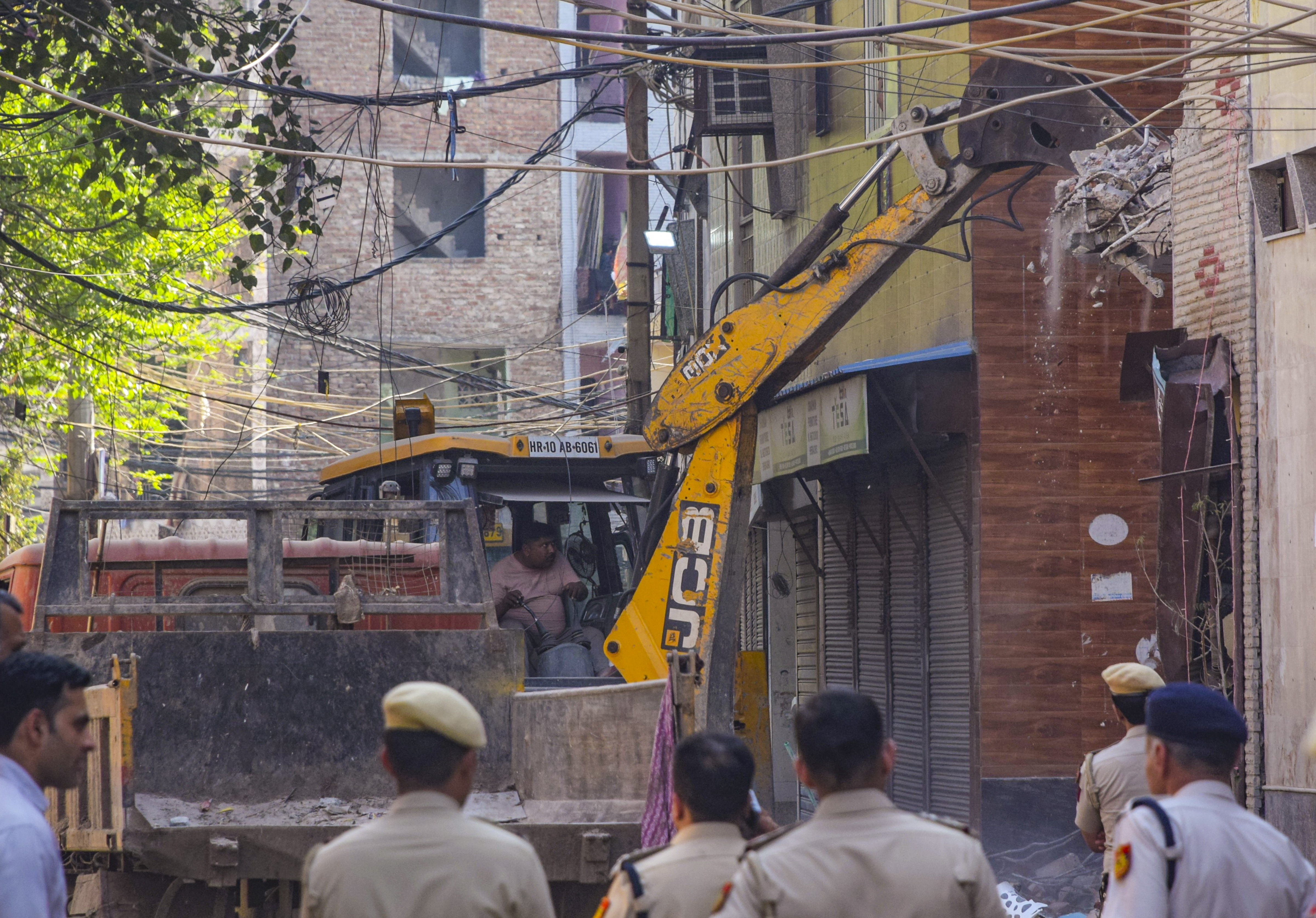 Part of house linked to Uttam Nagar killing accused razed, MCD says structure was built on drain