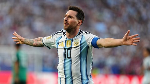 Messi’s hat-trick powers defending champions Argentina past Algeria 3-0