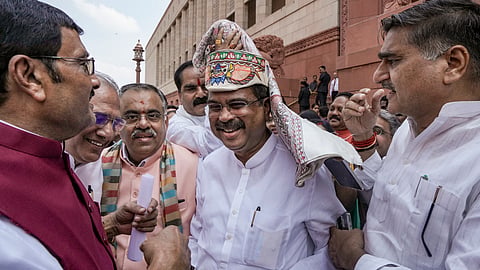 BJP MPs welcome Dharmendra Pradhan to Parliament after resignation; Congress slams celebration
