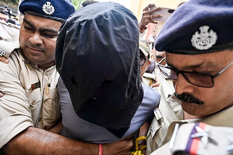 West Bengal Police STF personnel escort suspected terrorist Hamim Mondal while producing him before a court in Burdwan, on Friday | File image/PTI