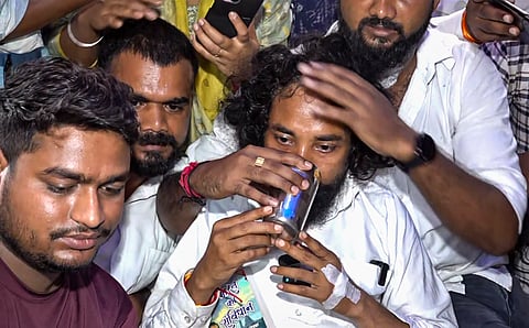 Jharkhand student leader Devendra Nath Mahato drinks water on the fourth day of his hunger strike, in Ranchi, on Wednesday | PTI