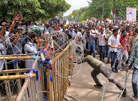 Security personnel stand guard as people march towards Jharkhand Assembly amid a protest, on Monday | PTI