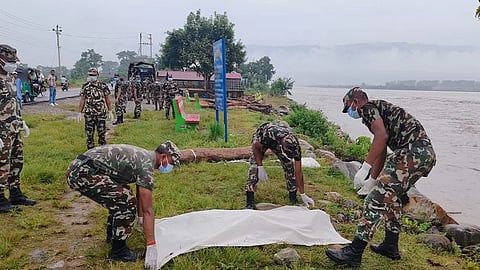 Authorities said the burials would take place only after DNA samples and other identifying information had been collected, allowing families to identify and reclaim the remains later