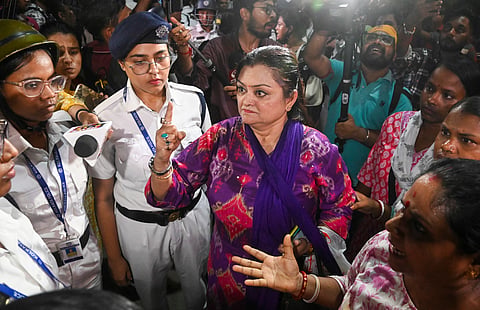TMC activists raise slogans after Kolkata Municipal Corporation officials pulled down an 'unauthorised' billboard from the roof of TMC leader Abhishek Banerjee's office, in Kolkata | File image/PTI