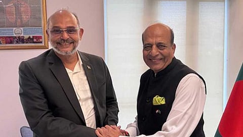 India’s High Commissioner to Bangladesh Dinesh Trivedi with Adviser to Bangladesh’s Prime Minister for the Ministry of Finance and Planning Rashed Al Mahmud Titumir in Dhaka