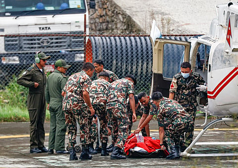 Nepal Army personnel shift Sanjay Sah, a rescued victim from Trisuli 3A Hydropower Project, to a hospital at Chhauni, in Kathmandu, Nepal, on Friday | PTI