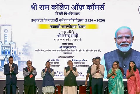 Prime Minister Narendra Modi with Union Minister Pralhad Joshi, journalist Rajat Sharma, and others, during the centenary celebrations of SRCC, in New Delhi, on Saturday | PTI
