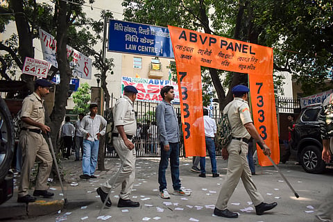 Police personnel stand guard ahead of the 'Delhi University Students' Union' elections, in New Delhi | File image/PTI