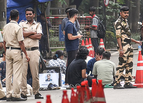Security personnel stand guard as students stage a protest following the death of a 22-year-old IIT Bombay student, in Mumbai | File image/PTI