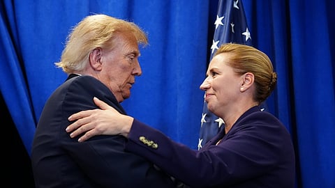 President Donald Trump talks with Denmark's Prime Minister Mette Frederiksen, after signing a security agreement during the United Nations General Assembly
