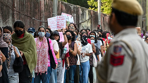 LSR students hold a solidarity march demanding enhanced safety measures following the alleged gang rape of a 17-year-old girl at nearby Aastha Kunj Park, in New Delhi, on Wednesday | PTI