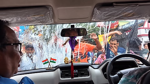 Kunal Ghosh alleged his car was attacked with stones and eggs in Hooghly, with TMC blaming BJP and the BJP calling it a public response | X