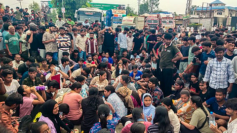 LPU students stage a protest and block the Jalandhar-Phagwara National Highway outside the campus, near Phagwara, in Punjab, on Sunday | PTI