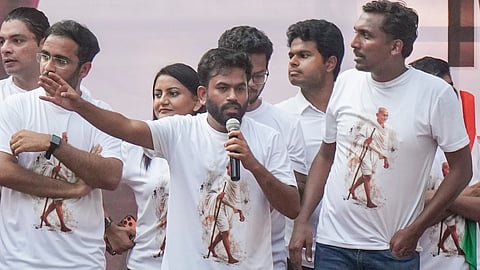 CJP founder Abhijeet Dipke addresses the gathering as co-convener Ashutosh Ranka looks on during a protest, at Shivaji Park, in Mumbai | File image/PTI