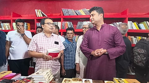 TMC's Kunal Ghosh visits CPM bookstall, condemns alleged attempt to demolish it with a bulldozer | Facebook