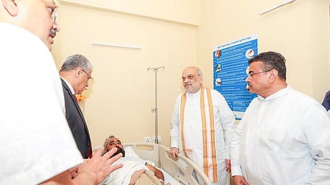 Amit Shah and Suvendu Adhikari meet those injured in the Chorbagan Durga Puja pandal stampede, at the Apollo Hospital, in Kolkata | File image/PTI