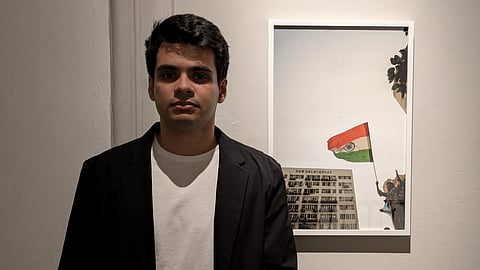 Artist and Photographer Raihan Vadra, son of Congress leader Priyanka Gandhi Vadra, with one of his photographs at Bikaner House, in New Delhi | File image/PTI