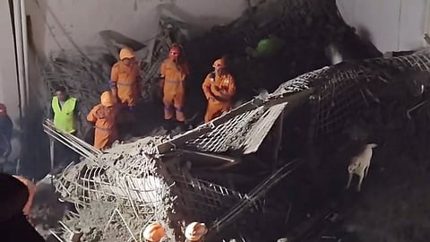 Five fire tenders rushed to the spot as authorities search through debris, with two workers suspected to be trapped beneath rubble