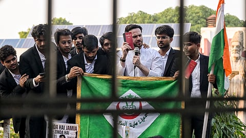 Jamia shifts classes online amid unrest, graffiti controversy and political confrontation over slogans supporting Kashmir separatism and Sharjeel Imam