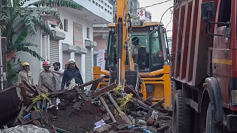 Two men die after a building's slabs give way during the construction of an additional floor in Harsh Vihar | PTI