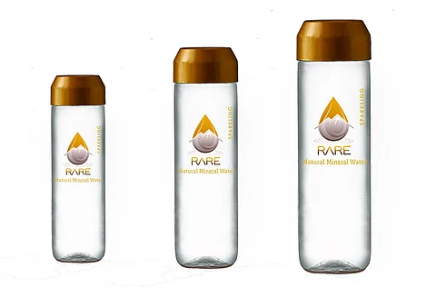 For its PET and glass bottles A&M Rare chose a cylindrical bottle shape with a flat base that’s sealed with a decorative cap as wide as the bottle.