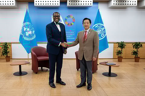 African Development Bank Group president Akinwumi Adesina (left) and Food and Agriculture Organization (FAO) Director General Qu Dongyu