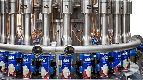 Serac and Budé Group developed net weight aseptic monobloc filler/crimper for whipped cream in aerosols at high speed