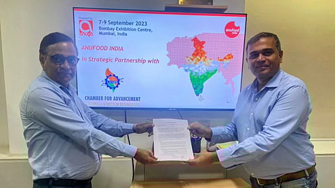 L to R - Milind Dixit, managing director of Koelnmesse India and Nilesh Lele, president of Chamber for Advancement of Small & Medium Businesses (CASMB) exchanging the MOU.
