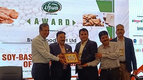 Amit Bajaj, founder and director of Vezlay Foods receiving an award at the 9th International Soy Food Conference