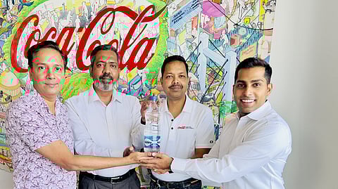 L to R - Vinay Henry (Coca-Cola), Rajesh Ayapilla (Coca-Cola), Neeraj Porwal (Coca Cola) and Utsav Dixit (ALPLA) present India´s first 100% recycled PET bottle for packaged drinking water