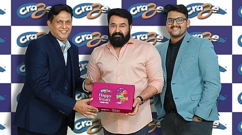 Craze Biscuits has appointed Mohanlal as their Brand Ambassador, Craze Chairman Abdul Azeez Chovanchery, Director Ali Ziyan, are seen alongside