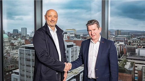 Peter Lauwers, CEO GEA Farm Technologies division and Terry Canning from CattleEye (right)