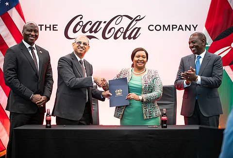 From left to right: Alfred Olajide, Vice President East and Central Africa Operations at The Coca-Cola Company, CCBA CEO Sunil Gupta shakes hands with Kenyan Cabinet Secretary for Investments, Trade & Industry, Rebecca Miano and Kenyan President, William Ruto