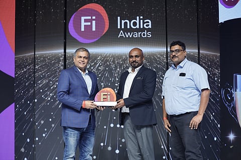 Award received by Prasobh S Prasad, Head R &D and Abhilash P, Scientist R & D from Mane Kancor