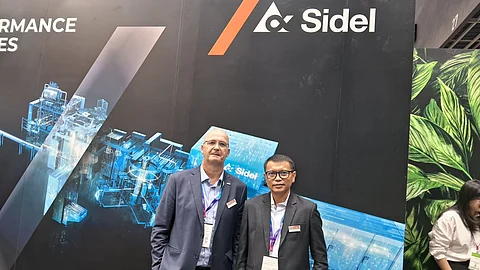 Loic Leon, Vice President Sales – South East Asia Pacific at Sidel (Left) and Parkpoom Praprom, Sales Director for Thailand, Cambodia, Laos, and Myanmar, Sidel at ProPak Asia