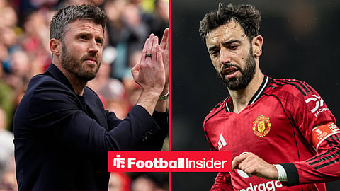 Manchester United manager Michael Carrick alongside midfielder Bruno Fernandes