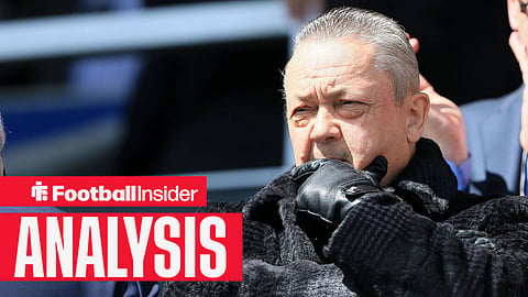 West Ham owner David Sullivan looks ponderous as he stands with one hand over his mouth.