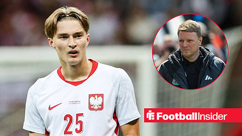 Kacper Potulski in a Poland shirt with Newcastle manager Eddie Howe