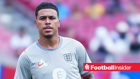 Morgan Rogers warming up in an England training shirt