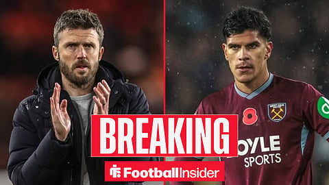 Michael Carrick applauds the fans at Old Trafford, with Mateus Fernandes in action for West Ham