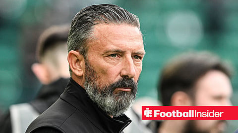 Hearts boss Derek McInnes standing on the touchline