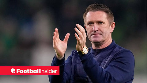 Manager Robbie Keane clapping the fans post-match.