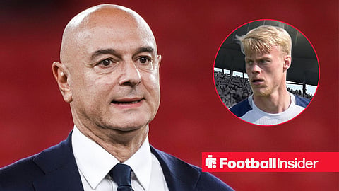 Daniel Levy in a suit on pitch looking forward smiling with Jan Paul van Hecke in action in a Spurs shirt right inset