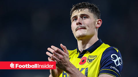 Spurs' Will Lankshear clapping fans after a game in Oxford home kit looking upset