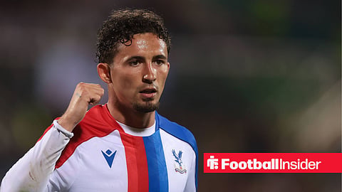 Yeremy Pino celebrating in a Crystal Palace away kit with fist in air
