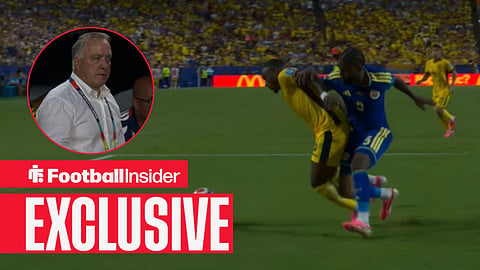 Sherel Floranus clashes with John Yeboah inside the penalty area in the game between Ecuador and Curacao / Curacao manager Dick Advocaat watches from the sidelines at the 2026 World Cup