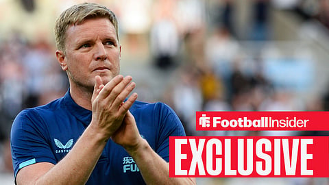 Eddie Howe clapping in dark blue Newcastle United shirt