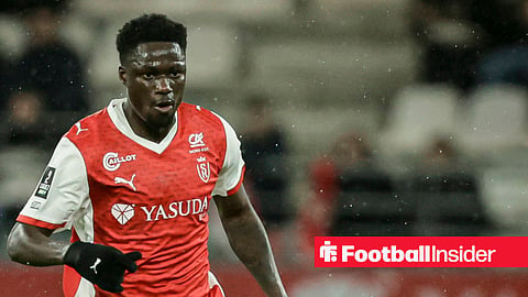 Mory Gbane in Reims kit playing football