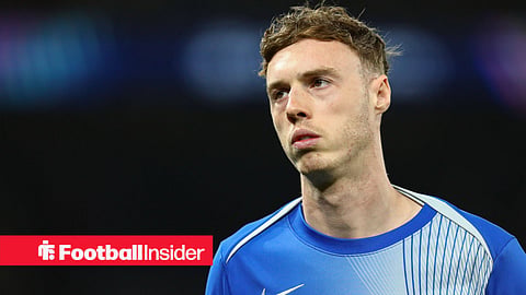 Cole Palmer warming up before a Chelsea game looking up